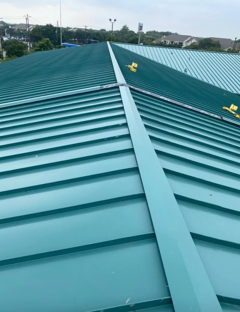 Green commercial metal roof ridge and valley for Metal Roof Repair in Pelican Bay